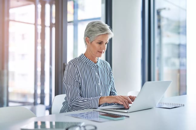 woman older laptop gettyimages .jpg