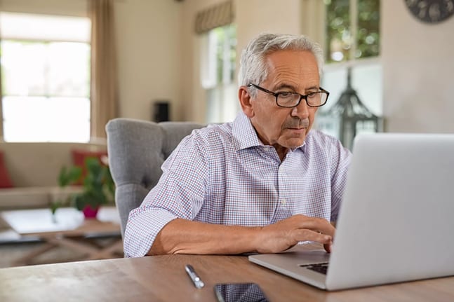 older man serious laptop gettyimages .jpg