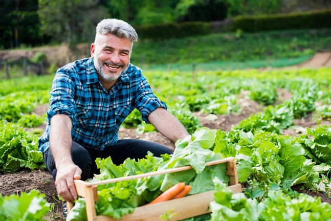 getty gardening smiling happy outdoors.jpg