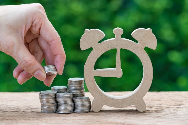 gettyimages coins and clock PfCM