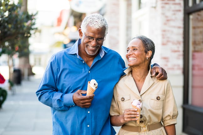 getty happy couple outdoors with ice creams