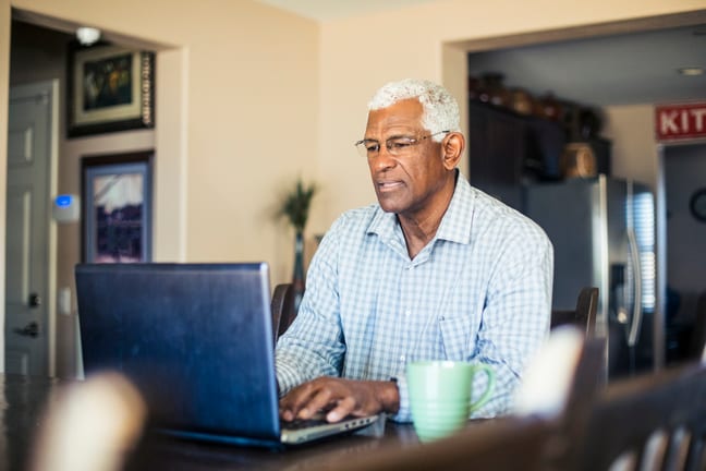 senior man laptop gettyimages