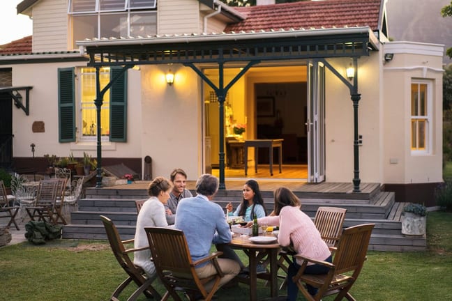 family eating at backyard table XzvkkVn.width