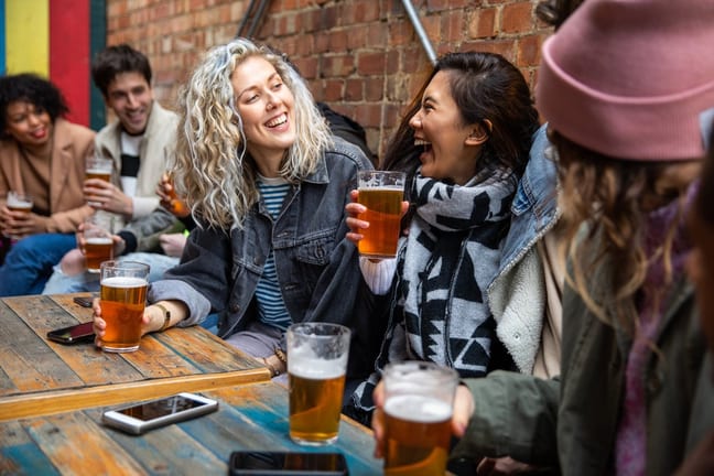 group of friends drinking beer lxeDhR.width