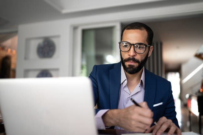investor studying laptop