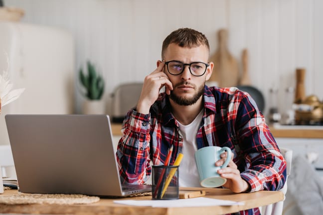 man s bored at laptop gettyimages