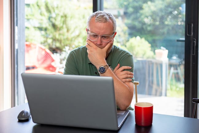 man s laptop by window gettyimages