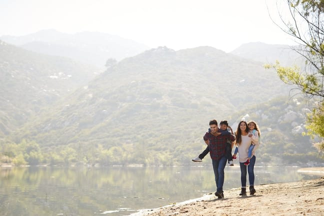 parents carrying young kids on hike hBSNf.width .jpg