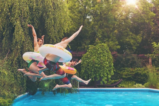 people jumping in pool RyUDQ.width .jpg