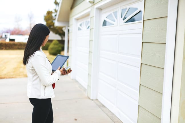 person appraising garage of home ywtXvs.width .jpg