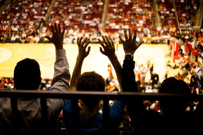 Spectators inside a basketball arena QOanBmo.width .jpg