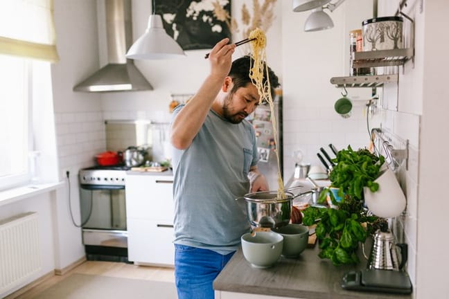 man cooking pasta at home.width .jpg