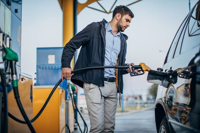 person pumping gas into car WkyEFR.width .jpg
