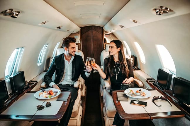 Successful couple making a toast with champag.width xXDQko.jpg