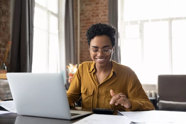 investor smiling computer.jpg