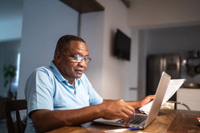 older man at laptop gettyimages .jpg