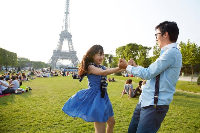 two people at eiffel tower ecTjov.width .jpg