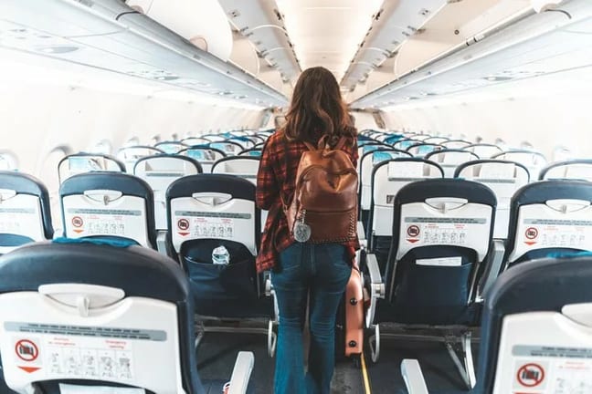 woman boarding airplane hOQp.width .jpg
