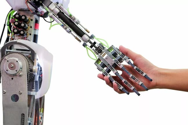 Robot Holding Human Hand Getty Images.origina.width XaMxljy.jpg