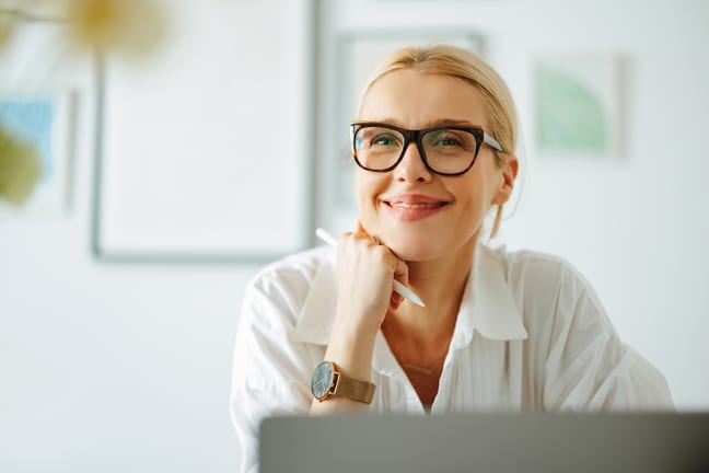 woman smiling laptop s gettyimages .jpg