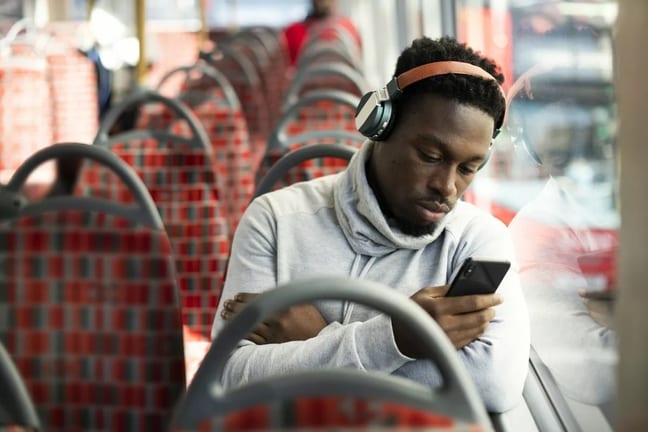 Man riding bus UVEyoyS.width .jpg