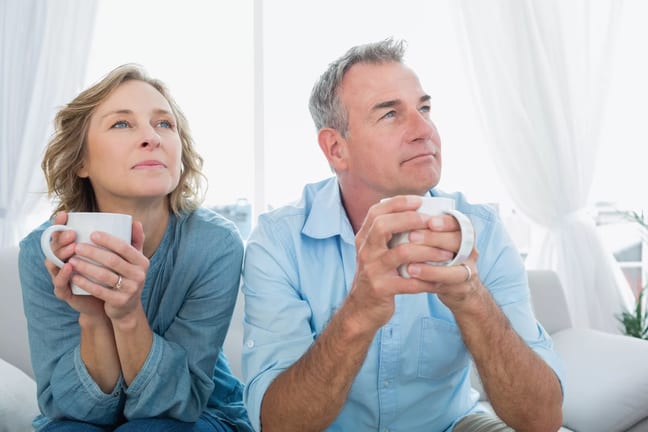 middle aged couple coffee cups.jpg