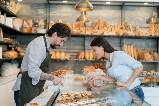 woman buying pastry at bakery.width .jpg