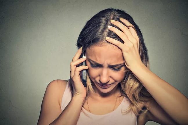 worried on the phone.width .jpg