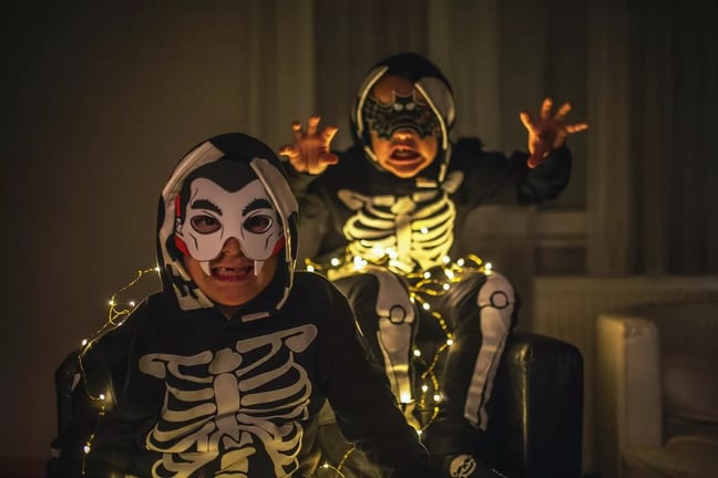 two young boys in Halloween costumes making s.width otPBj.jpg