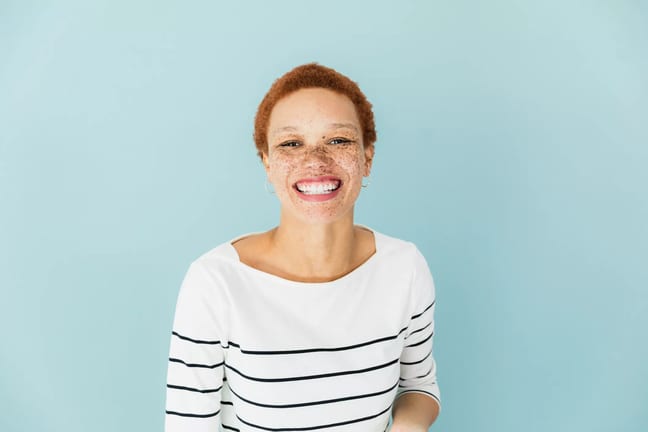 getty smiling freckles happy.jpg