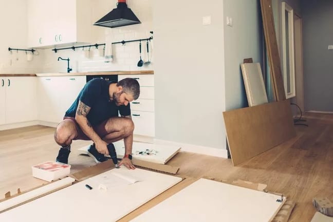 man doing home renovations.width .jpg