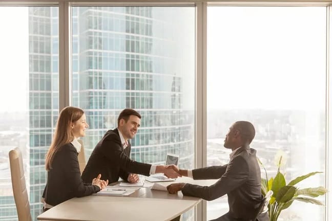 employee shaking hands with bosses RJKQsE.width .jpg