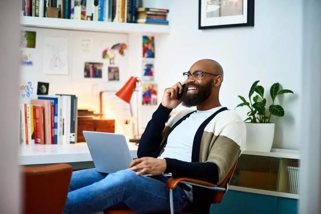 man on phone working from home aUIXxK.width .jpg