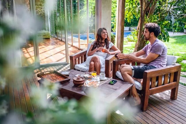 couple at backyard table OvOQ.width .jpg