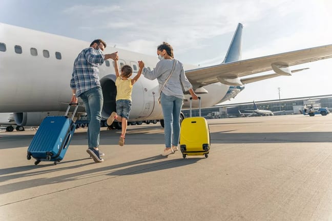 family vacation plane travel suitcase luggage.width .jpg
