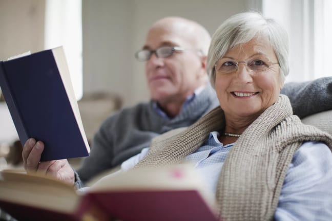 getty older couple reading books.jpg
