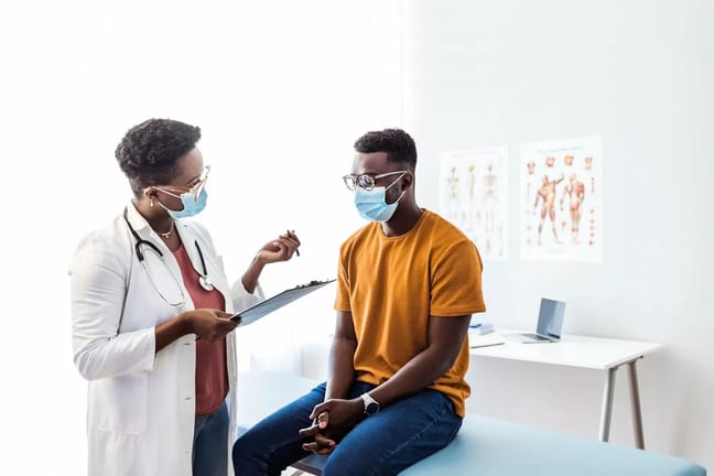 doctor and patient in exam room UdTAfov.width .jpg