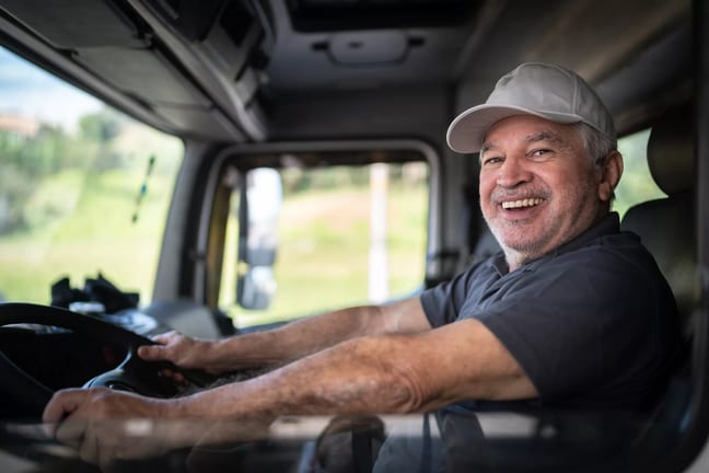 getty smiling happy truck driver.jpg