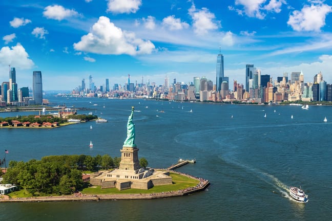 getty statue of liberty and new york city harbor aerial photo.jpg