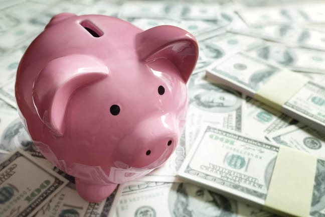 gettyimages piggy bank on a pile of money.jpg