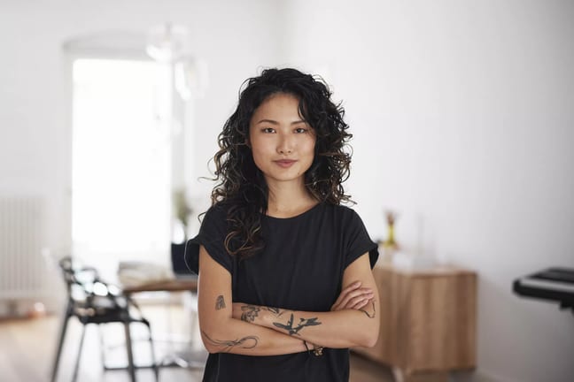 getty arms crossed strong serious expression thinking wondering.jpg