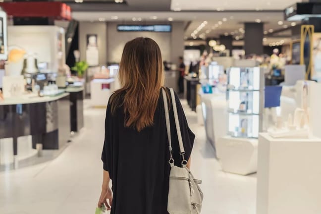 Woman shopping department store QDEWuO.width .jpg