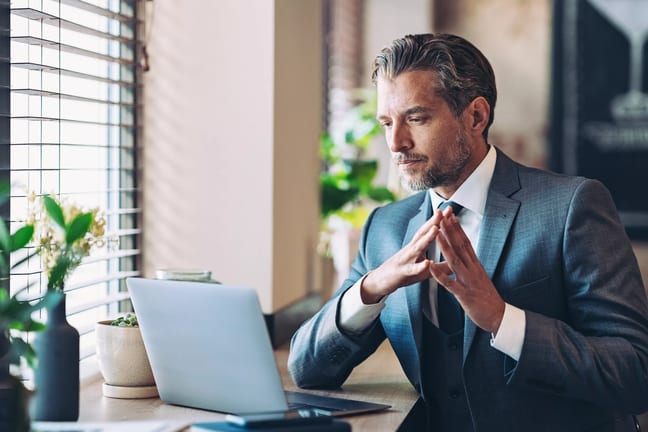 man biz suit laptop serious gettyimages .jpg
