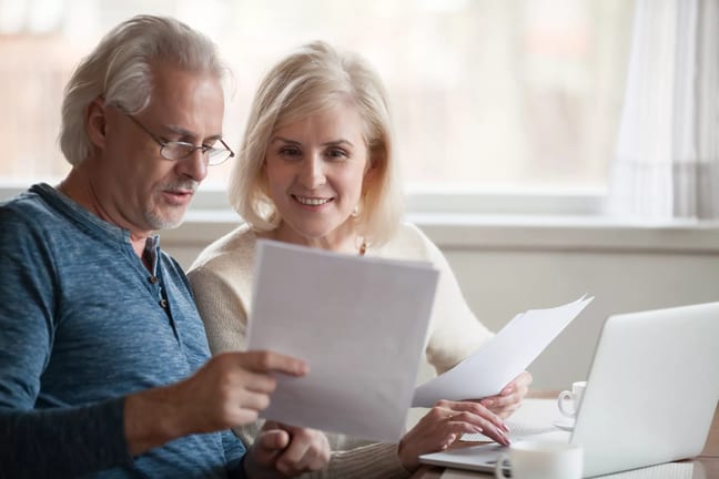 retired couple looks at papers.jpg