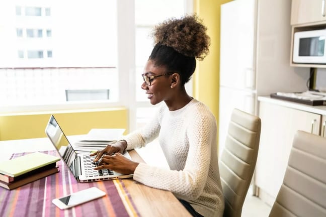 woman performs online job search from home SW.width .jpg