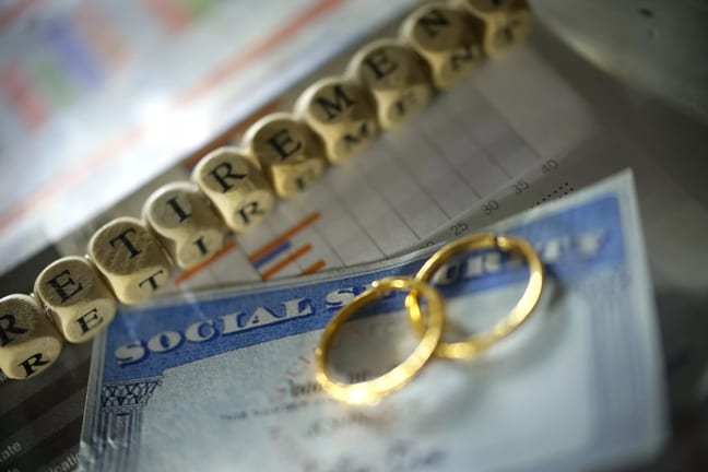 social security card with wedding rings.jpg