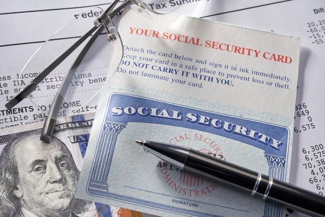 gettyimages social security glasses hundred dollar bill.jpeg