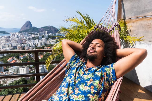 person relaxing in hammock on balcony.jpg