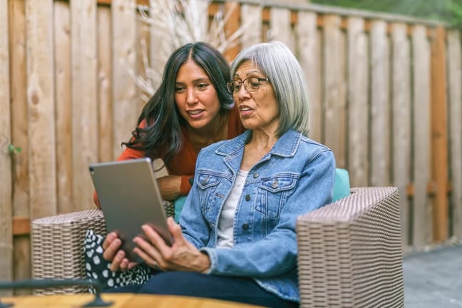 two people looking at tablet together.jpg