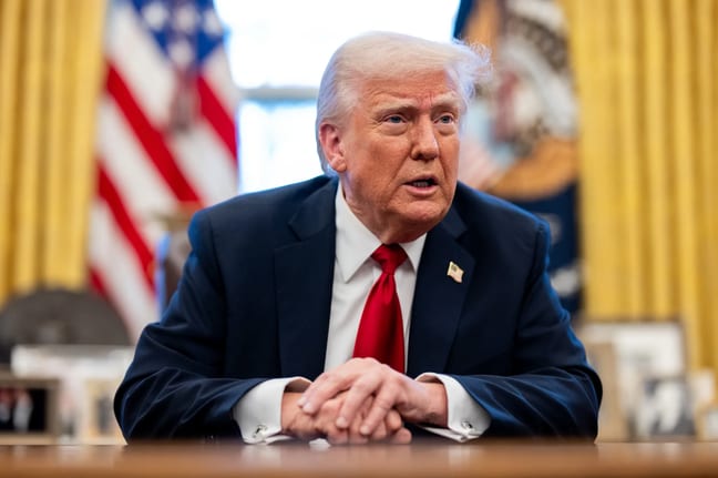 the white house close up of trump at the resolute desk.jpg